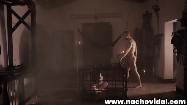 Nacho Vidal finds racy Susy Gala in a cage, naked but for her bondage collar; she sucks his face and his thick cock through the bars. He eats her shaved pussy and finger her to a squirting orgasm.