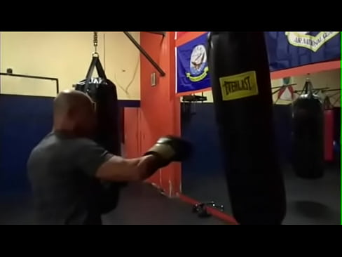 Maxxx loadz working out on heavy bag with boxing gloves on striking the bag    html5player.setencodedidvideo('uofbfav44d8