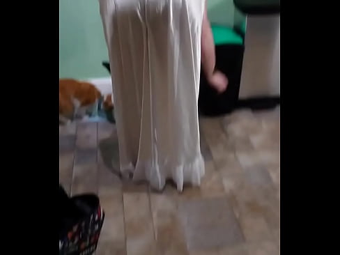 Wife working from home in satin nightgown    html5player.setencodedidvideo('umceevvd2b5