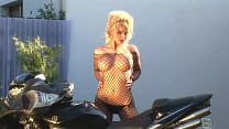 Blonde Bombshell Caylian Curtis Is A Biker's Dream In Fishnet Solo Scene