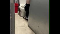 boy opens cubicle and catch his friend peeing (...