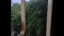 Husband fucking wife in doggy style by enjoying the rain...