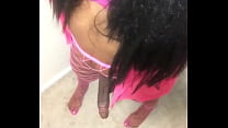 Ebony Black Tranny In Pink Swings Cock