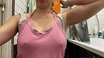 Strong woman shows her muscles and armpits