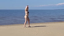 Mature beach slut invites guys to fuck her holes