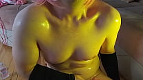Femboy's Smooth Legs Shimmer Under Colorful Lights