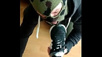 licking sneakers