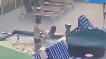 Caught couple fucking in the pool at home