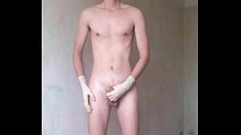 Man wanks in medical gloves...