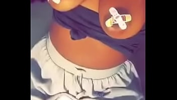 Ebony slut showing tits...