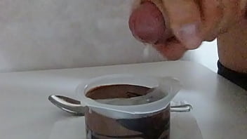 Cumming on chocolate mousse and eating it. Cum on food