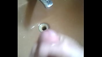 Quickie and hot handjob in the bathroom