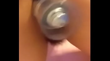 amateur latina shakes ass with bottle in pussy