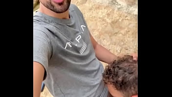 Hot daddies sucking each other big cock outdoors