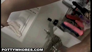 Goth babe sucks her tampons and takes a pee