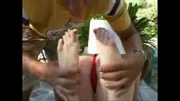 Redhead Jerking A Dick With Her Feet