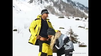 Sharon bright is on a snowy mountain giving a ski instructor...