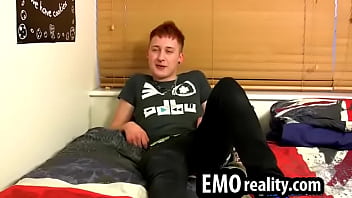 Sexy and young emo twink talks to the camera and jerks off