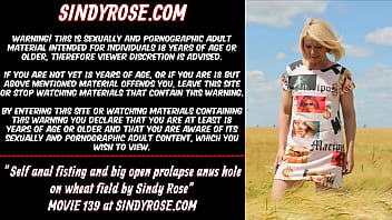 Video Self anal fisting and big open prolapse anus hole on wheat field by Sindy Rose