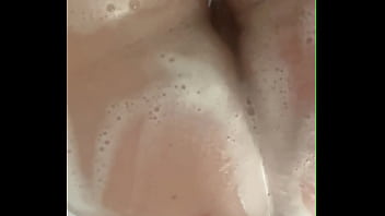 Horny British Slut Plays with herself in the shower