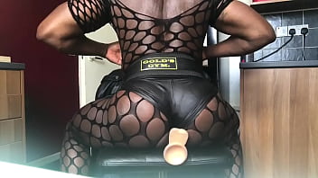 Black Bodybuilder Takes Dildo in Fishnet Stocking