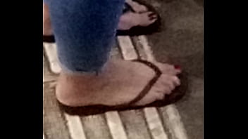 Phat butt and Lickable candid teen feet red puedicure in sandals by night outide voyeur...