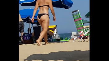 Candid on this little slut at...