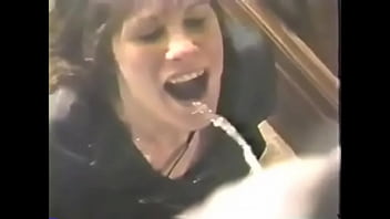 Beautiful And Sexy Milf Gets A Lot Of Piss In Her Mouth...