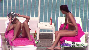 Topless sisters tanned and oiled up with pierced nipple &amp_ tattoos 3of3