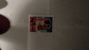 Huge cumshot on a picture of pornstar peaches while she spreads her legs