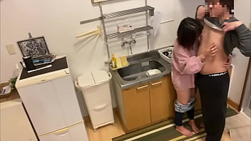 A wife whose husband invites his cheating partner home while he is on a business trip, has sex with him in the kitchen, and cheats on him.