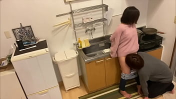 A wife whose husband invites his cheating partner home while he is on a business trip, has sex with him in the kitchen, and cheats on him.
