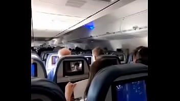 Young girl enjoying on the plane