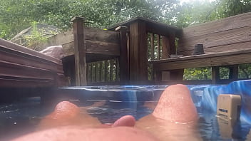 Cock rising from the hot tub