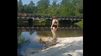 Video public peeing outside summer on the river