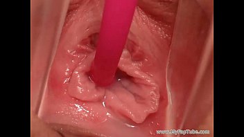 Sexy girls uses speculum and vibrator  