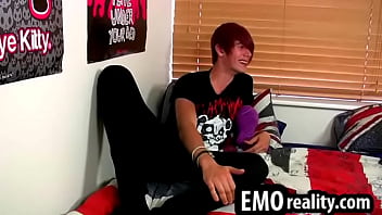 Emo teen removes his clothes to tease his cock