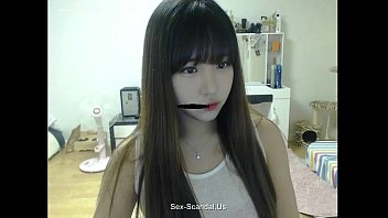 Pretty korean girl recording on camera