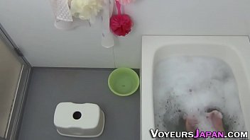 Masturbating asian pisses