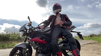 Wanking and cumming on my bike in full leathers and helmet