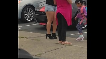 Two hot Asian milfs wait for the bus