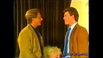 Blonde greedily sucks two dicks