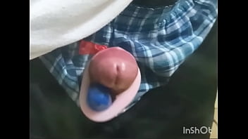Rotor masturbation with a penis sticking out of the pants