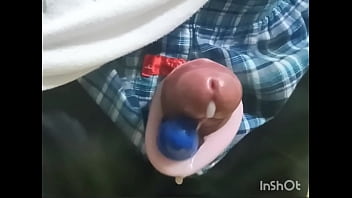 Rotor masturbation with a penis sticking out of the pants