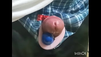 Rotor masturbation with a penis sticking out of the pants