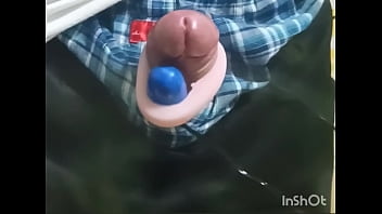 Rotor masturbation with a penis sticking out of the pants