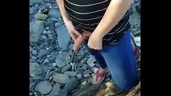 trans sissy piss on the beach