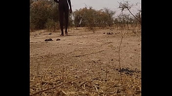 African man nude in forest