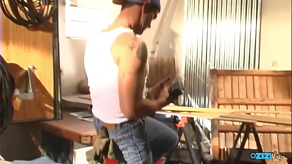 A handsome car mechanic smashes slim brunettes tight pussy in his workshop.