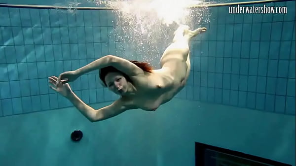 Hot babe swims in the sea like a mermaid Thumbnail